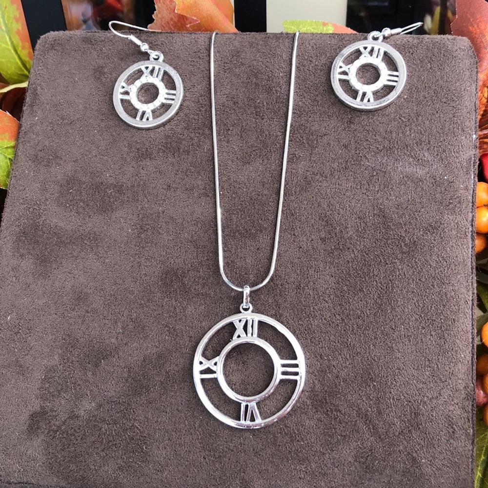 Sterling silver pendant and earrings